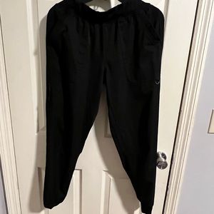 Black Ava Therese jogger scrub pants. Size Medium.